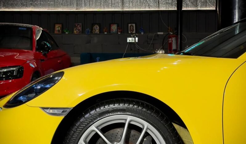 
								Porsche 718 Boxster full									